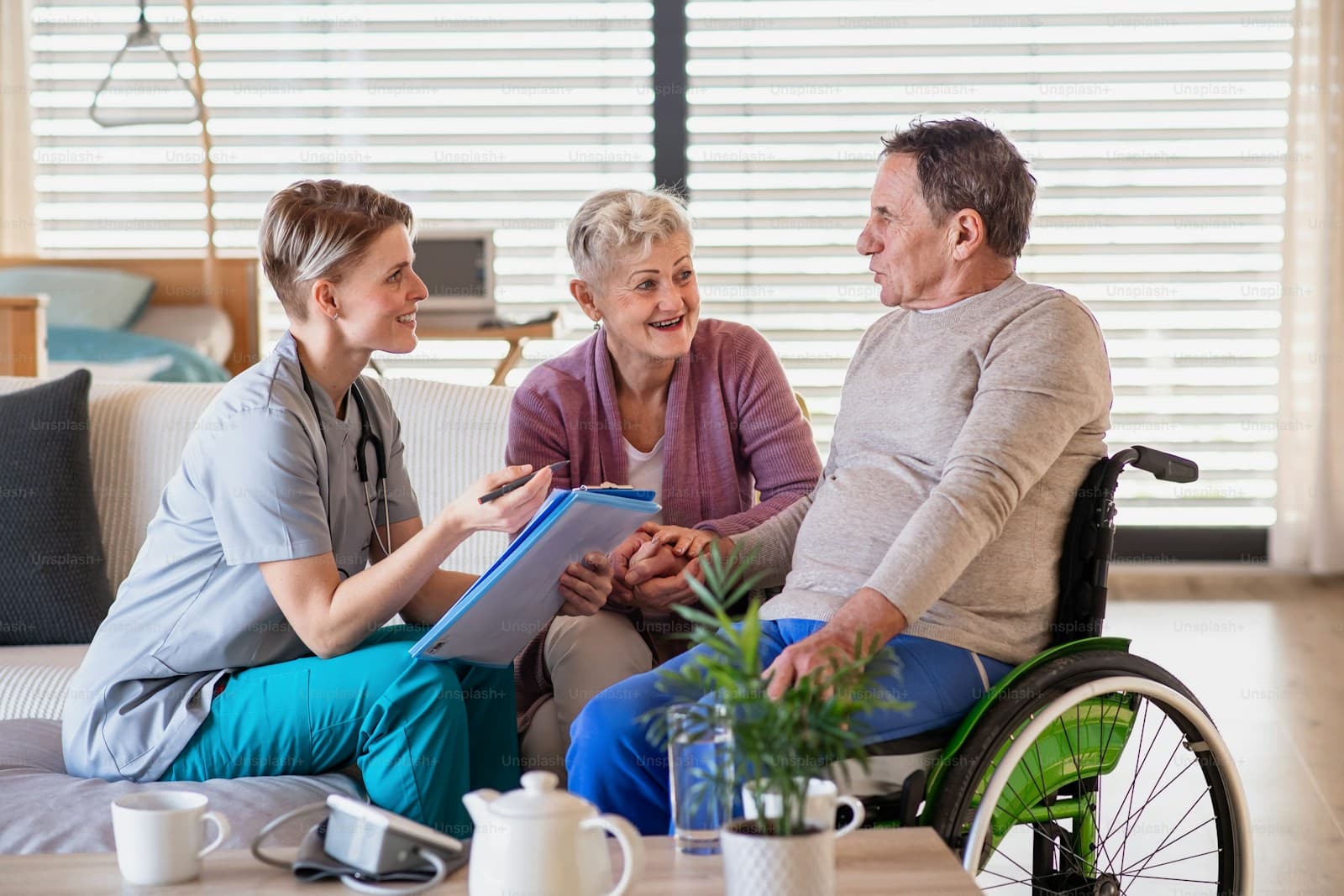 A healthcare professional caring for a patient at home